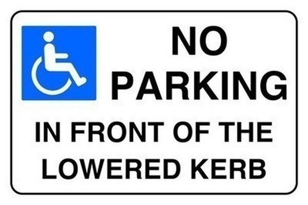 Parking in Front of the Lowered Kerb sign in use