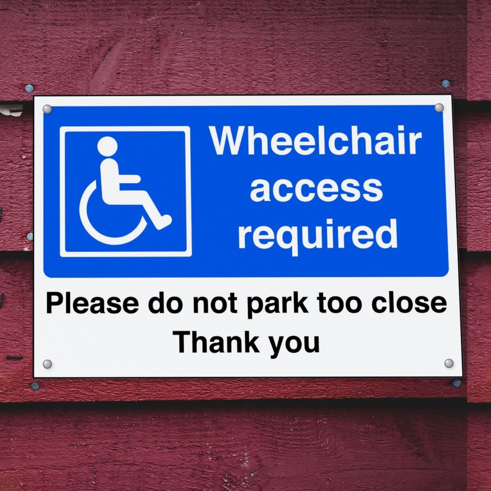 Wheelchair Access Required Please Do Not Park Too Close Thank You sign in use