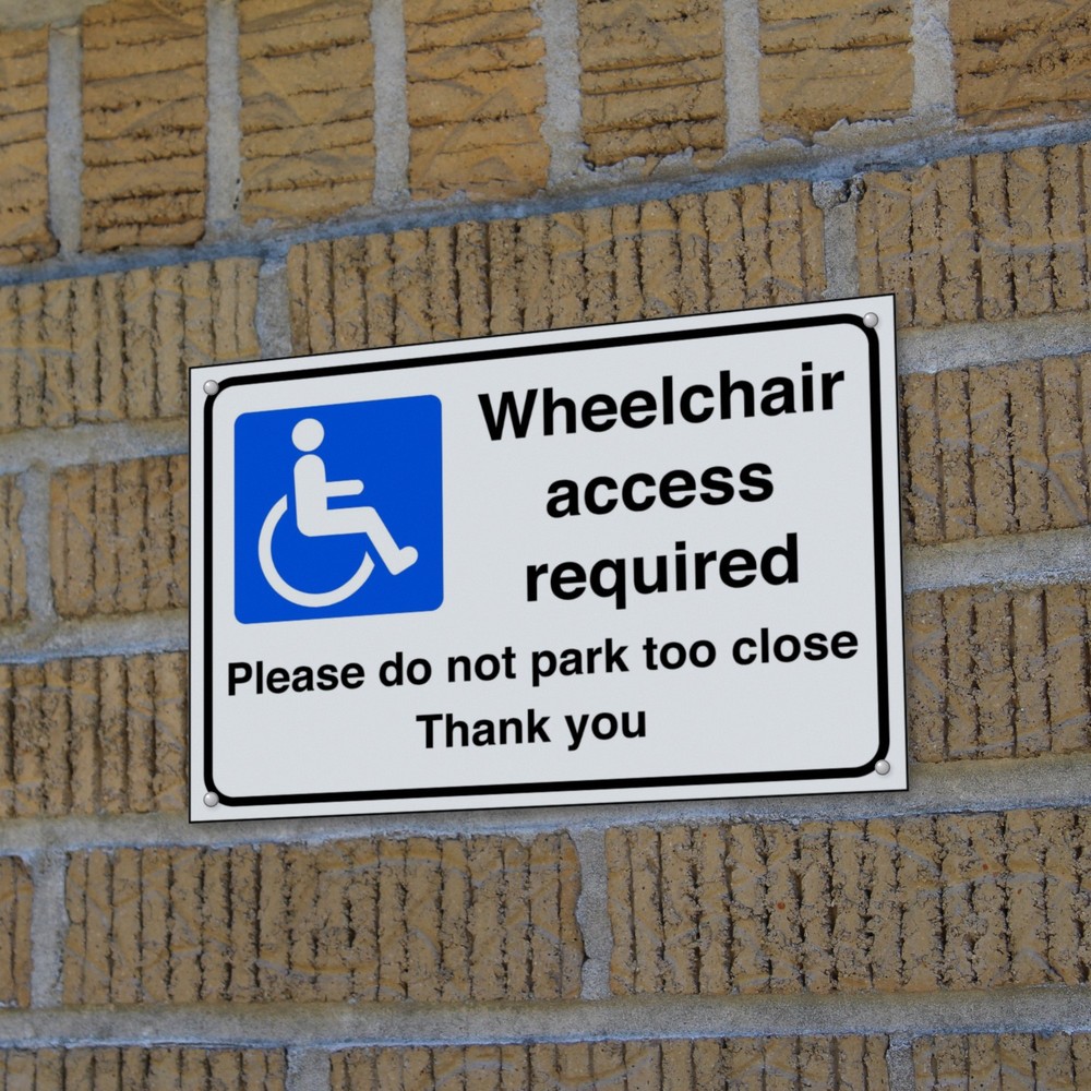 Wheelchair Access Required Please Do Not Park Too Close Thank You sign in use