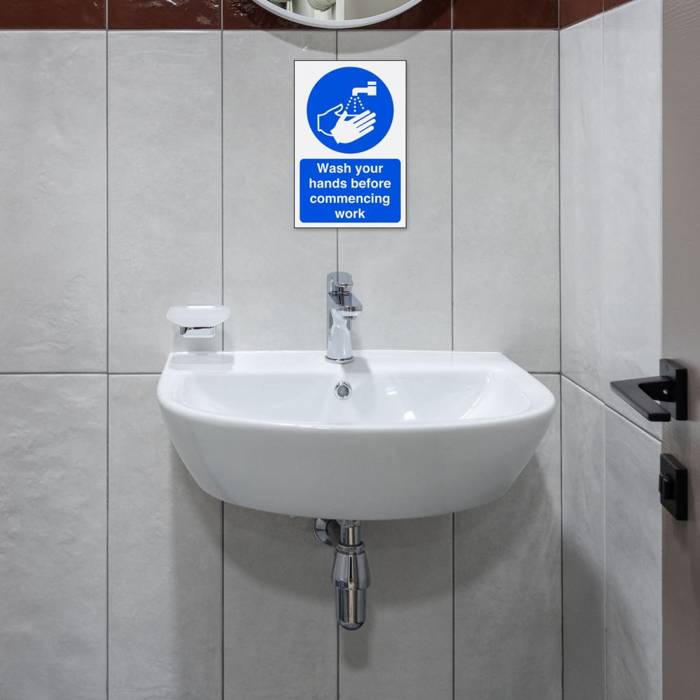 Wash Your Hands Before Commencing Work sign in use