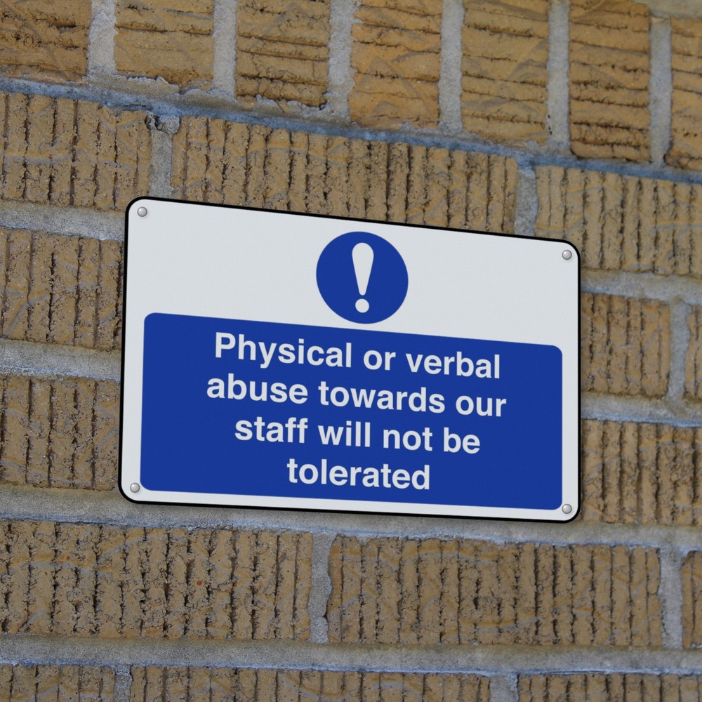 Physical or Verbal Abuse Towards Our Staff Will Not Be Tolerated sign in use