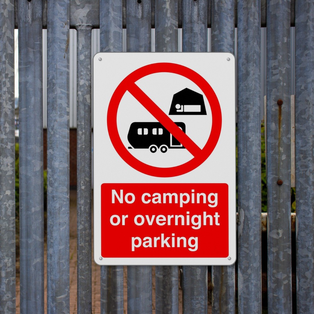 No Camping or Overnight Parking sign in use