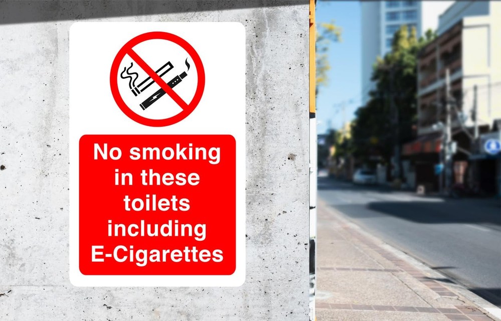 No Smoking in These Toilets Including Vaping sign in use