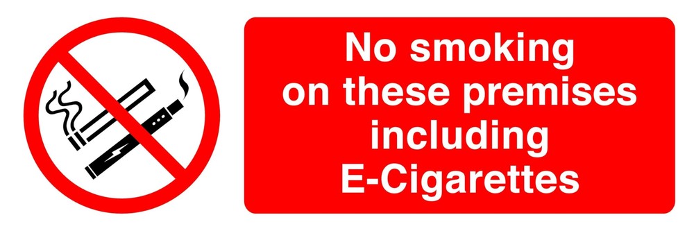 No Smoking on These Premises Including Vaping sign in use