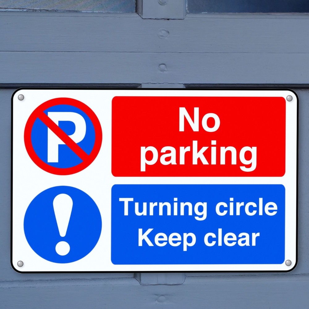 No Parking Turning Circle Keep Clear sign in use